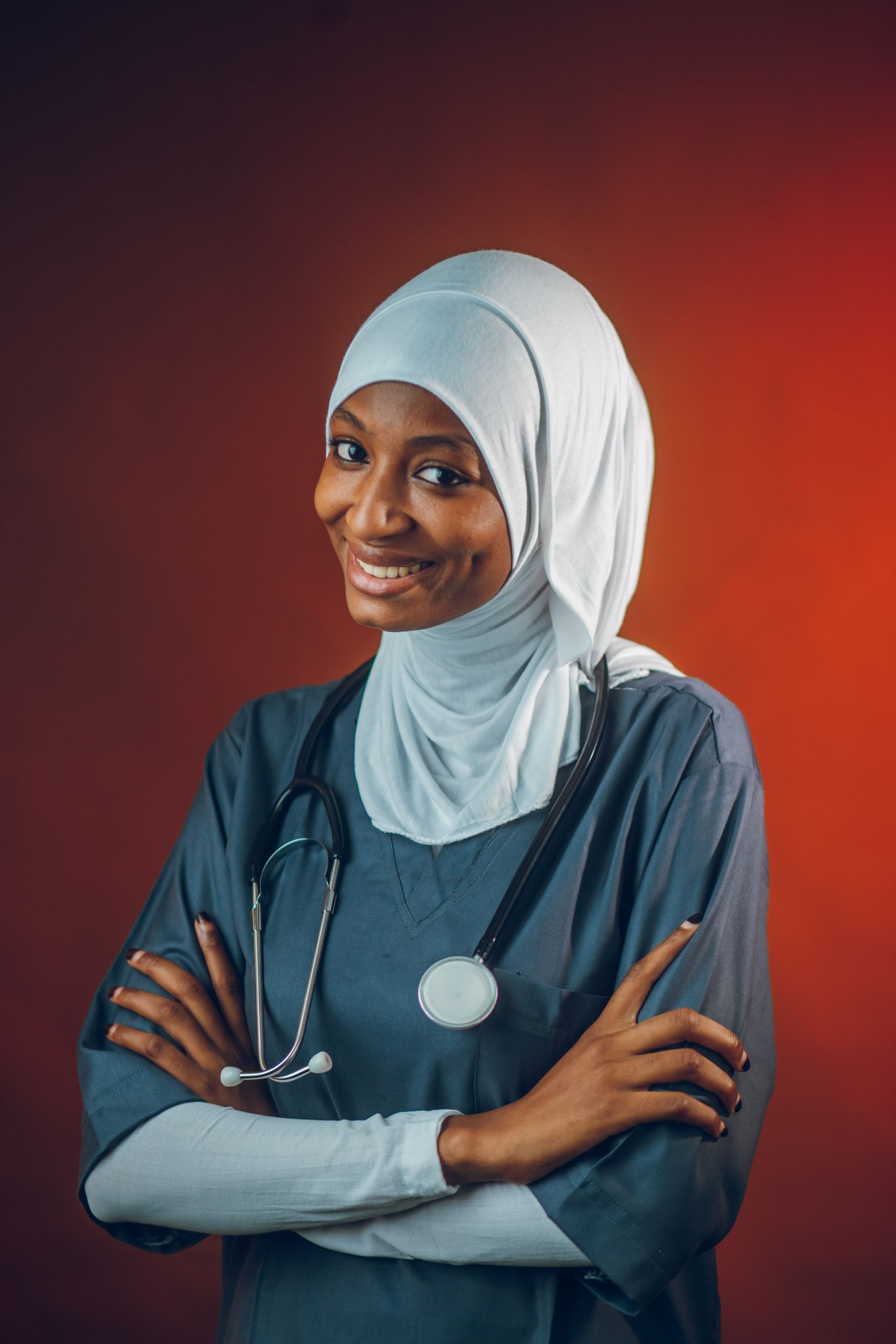Female clinician wearing a hijab, representative of Dubai’s diverse medical community — not a named Clinova doctor.